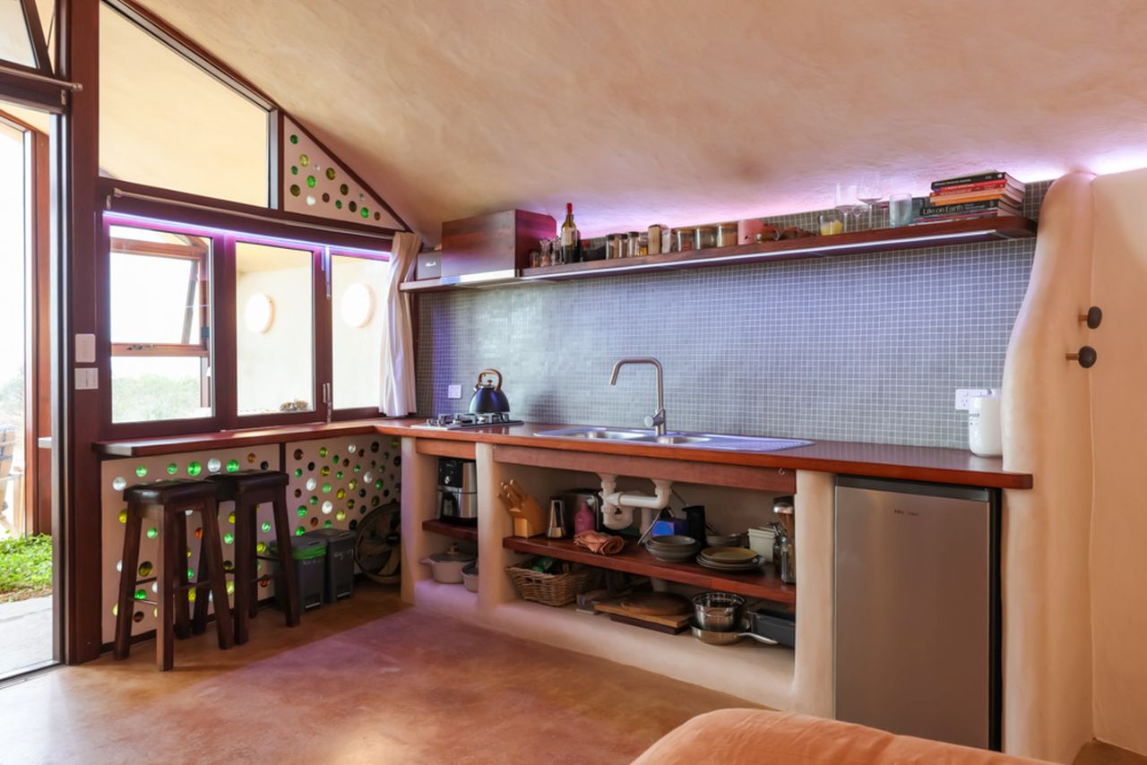 This Earthship Tiny Home in Australia is Bushfire Resilient