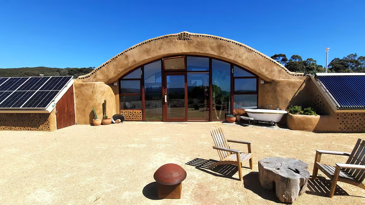 This Earthship Tiny Home in Australia is Bushfire Resilient